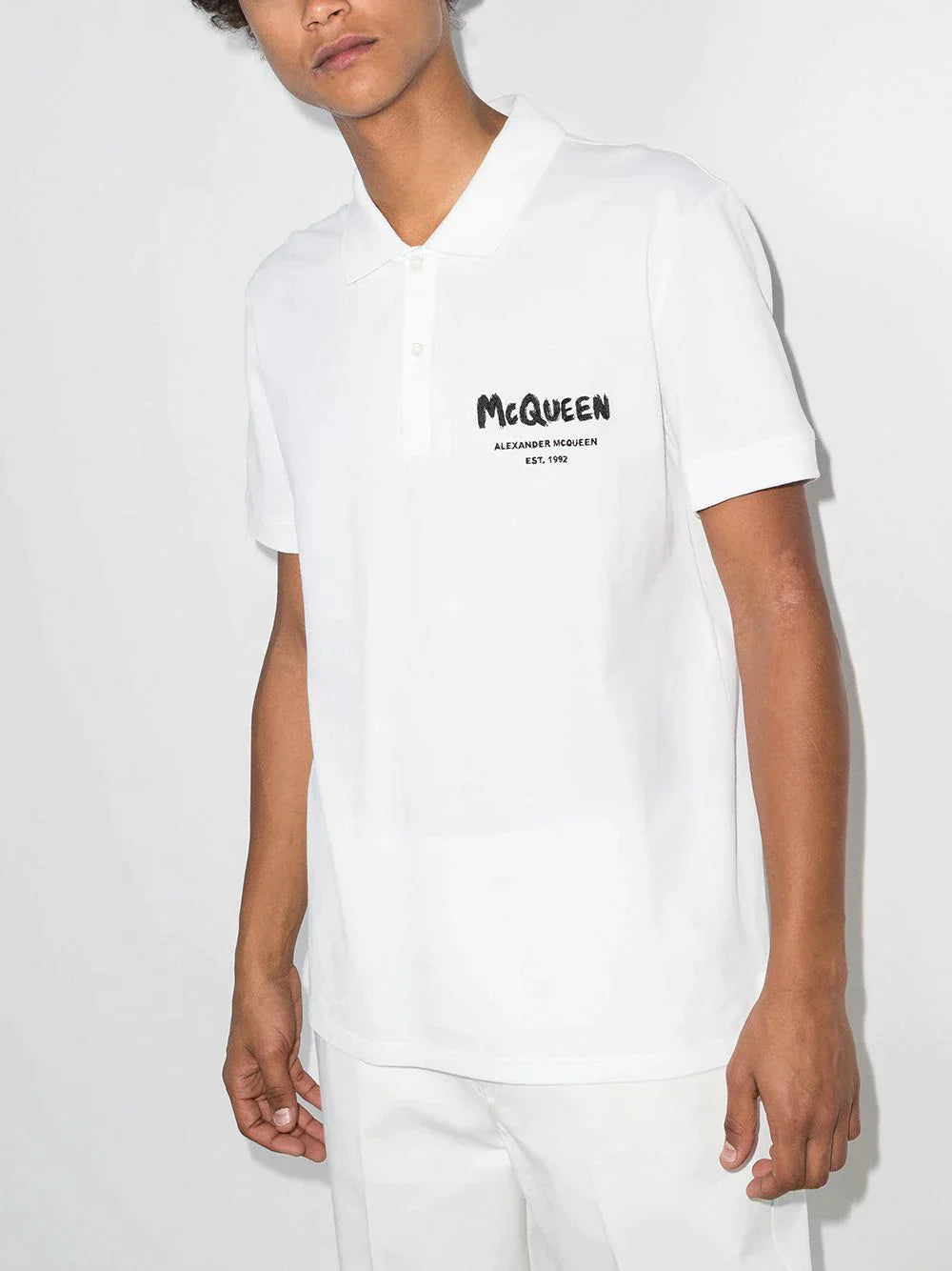 graffiti logo polo shirt by alexander mcqueen - bottegalusso: premier destination for modern luxury menswear