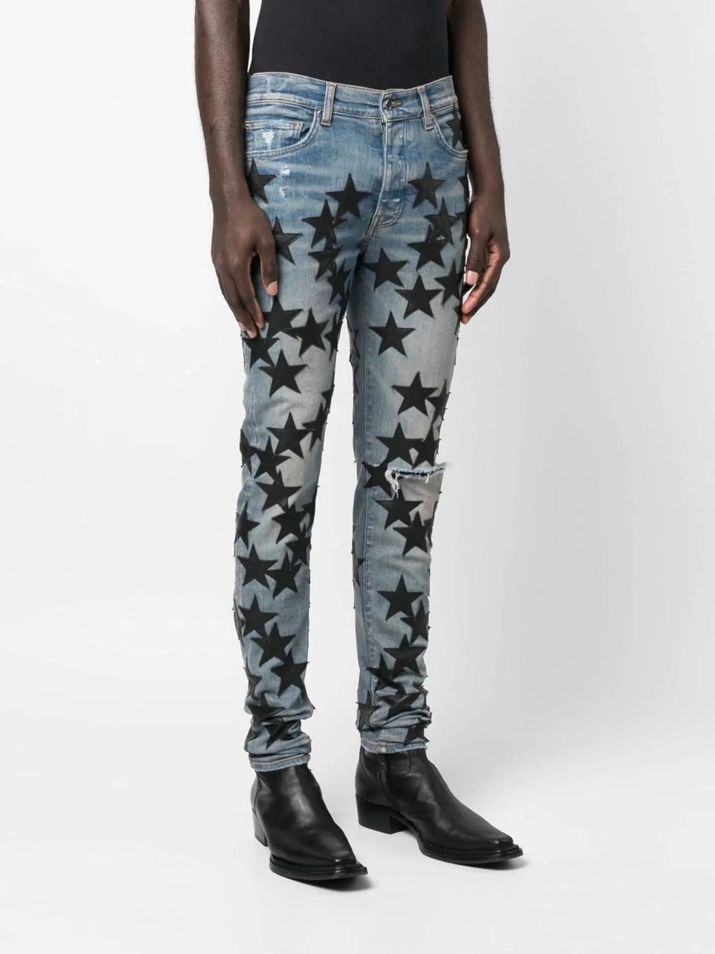 star patch skinny jeans by amiri - bottegalusso: premier destination for modern luxury menswear