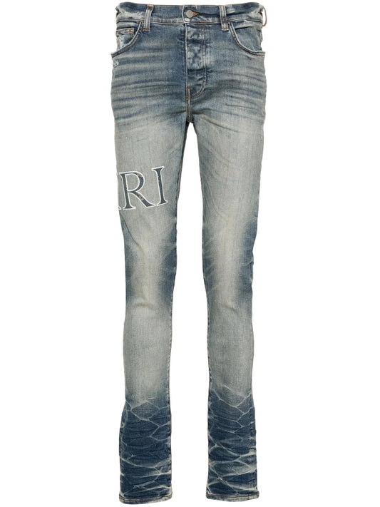 Core Logo Patch Skinny Jeans by Amiri - bottegalusso: Premier Destination for Modern Luxury Menswear